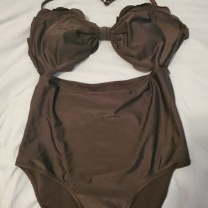 Never worn scalloped cut-out one piece suit